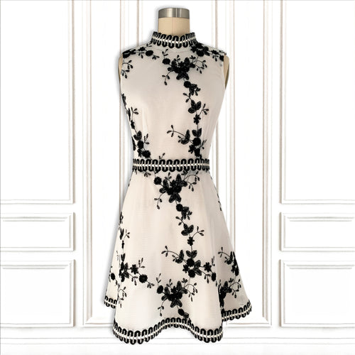 High-Tech Performance Fabric White Mini Dress with Crochet Trim - Luxury Resort Collection.