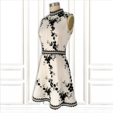 High-Tech Performance Fabric White Mini Dress with Crochet Trim - Luxury Resort Collection.